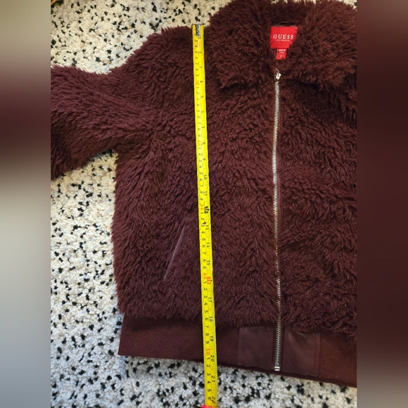 GUESS Faux Fur bomber jacket. Zip up. Fully lined. Size Small. Eggplant/ Purple. - Picture 9 of 10